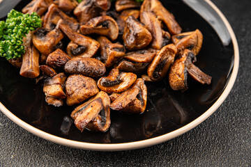 Mushrooms fried champignons vegetables dish fresh delicious gourmet food background on the table rustic food top view copy space keto and paleo diet vegetarian and vegan food