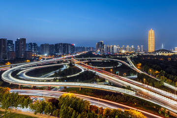 Fototapeta premium Night view of CBD and overpass in Zhengdong New District, Zhengzhou, Henan, China