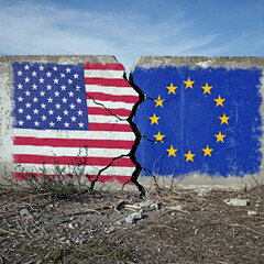 Concept of breakup between the USA and the European Union, represented by their respective flags on a concrete wall