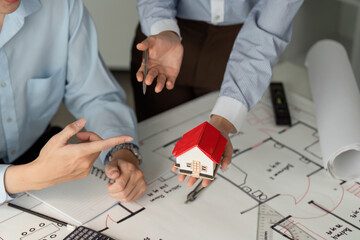 Housing Project Discussion and Planning. Professionals engaged in collaborative housing design...