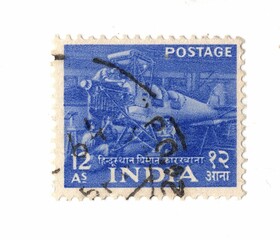 A vintage postage stamp from India isolated on a white background.