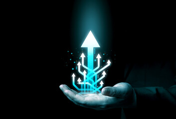 Report growing and increasing profits. Many raising arrows from hand on dark background. concepts...