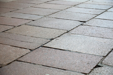 Granite slabs form the surface of a paved square in the Main City, part of Gdansk, Poland