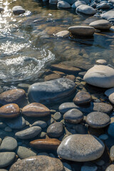 Mesmerizing Riverbed, Polished Stones, Gentle Currents, Misty Mornings, Sunset Glow & Nature’s Artistry in Flowing Water – A Stunning Showcase of Earth’s Timeless Craftsmanship