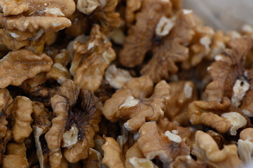 Delicate walnut halves showcase rich textures and earthy tones in a bountiful display ready for...
