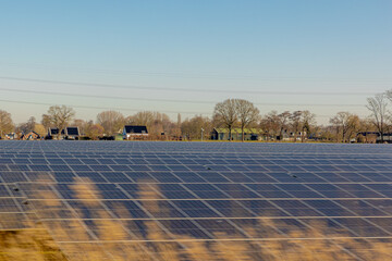 Rows or lines of solar cell panels in countryside, Photovoltaic cell is an electrical device that...
