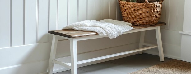 Radiant Uncluttered Comforting Cozy entryway with bench and wicker basket.