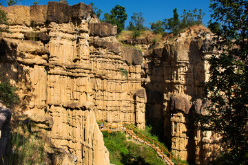 Pha Chor canyon cliffs in jungle wild forest of Mae Wang National Park for thai people and foreign travelers travel visit and trekking hiking on trailing nature park at Doi Lo in Chiang Mai, Thailand