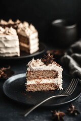 Delicious spiced cake with creamy frosting served on a dark plate at a cozy setting