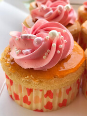 cupcake with pink cream.