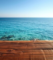 Fototapeta premium Rustic wooden tabletop overlooking calm blue ocean, beach, peaceful