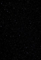 Obraz premium Vast, inky black space background sprinkled with countless shimmering stars, cosmos, pattern, texture