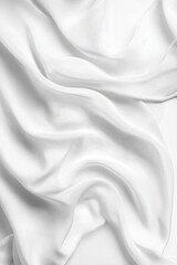 Obraz premium Elegant white fabric with flowing, smooth curves. The textile drapes gracefully, creating a soft and airy effect. Pure and simple texture of silk.