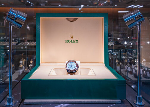 tokyo, nakano - jan 08 2025: A luxurious Rolex watch designed by the Swiss watchmaker displayed in an elegant box under spotlights showcasing its intricate craftsmanship and appeal to affluent buyers.