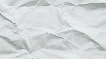 Obraz premium Crumpled White Paper Texture Background for Creative Design Projects and Print Media