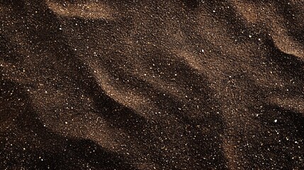 Dark sand texture, wind-blown ripples, desert background, design element