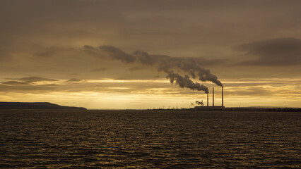 factories in open space field sea