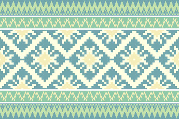 Geometric seamless pattern in blue green and yellow inspired by ethnic and tribal textile designs.