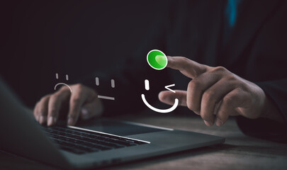 Customer satisfaction rating concept with digital feedback icons. Businessman selects a smiling...