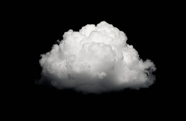 Fluffy white cloud illuminated against a deep black background