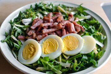 Dandelion salad with hard-boiled eggs and bacon, diuretic, vitamin, healthy food