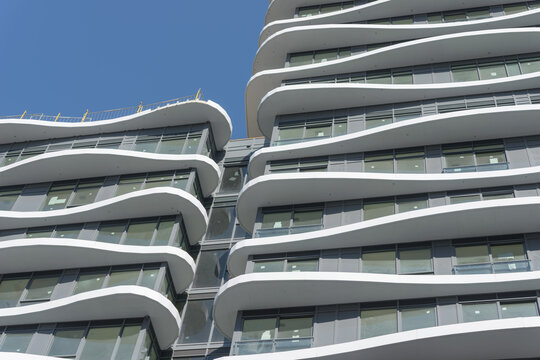 skyward oblique angle view of Artistry Condos by Tribute Communities south facing side located at 292 Dundas St W in Toronto, Canada