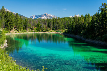 The Third Lake of Valley of the Five Lakes. Tranquil Turquoise Lake in Jasper National Park,...