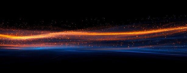 Abstract high-speed light trails featuring vibrant orange and blue streaks against a dark black background