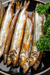 smoked capelin fish sprat vegetables dish fresh delicious gourmet food background on table rustic food top view copy space pescetarian diet