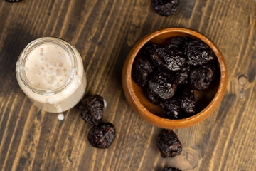 fresh cow's milk yogurt with prune flavor with dried plum slices