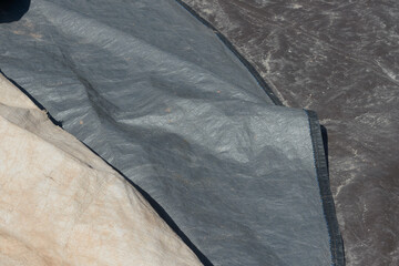 beige gray and brown tarp material