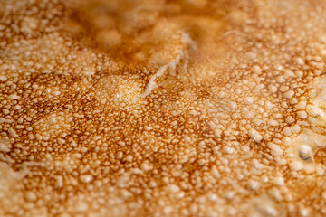 butter melts on fresh hot pancakes