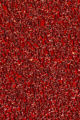 red coarse-grained sandpaper for working with wood and metal