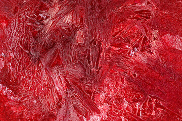 ripe red raspberries frozen in water