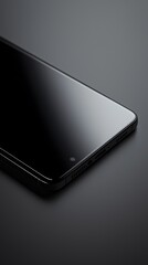 Sleek smartphone on a dark surface.