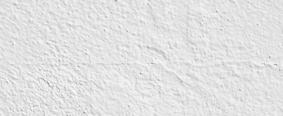 Dirty white concrete wall texture background. Uneven render stucco white painted concrete wall texture background. Rough and grunge wall in the sun.