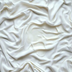 A close up of white silky fabric with a creamy texture