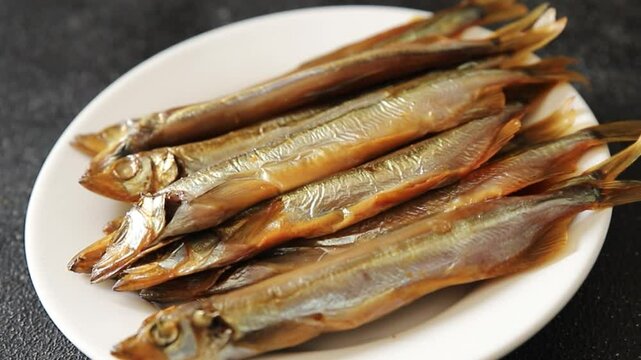 smoked capelin fish sprat vegetables dish fresh delicious gourmet food background on table rustic food top view copy space pescetarian diet