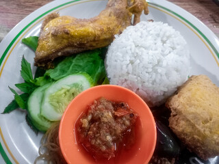 Indonesian Food Menu Photos For your food and beverage business.
Fried duck with spicy sambal.