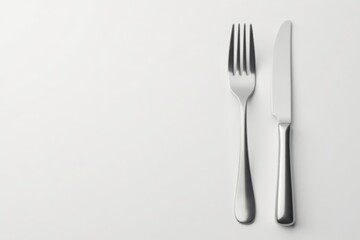 Elegant silver knife and fork, pristine white backdrop, equipment, luxury