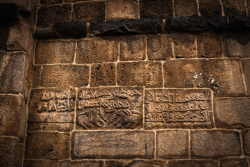 Ancient carvings  and wall detail Historical Diyarbakir Fortress: History of the Kurds. Close-up