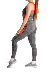 Fototapeta premium Young woman in sportswear on white background