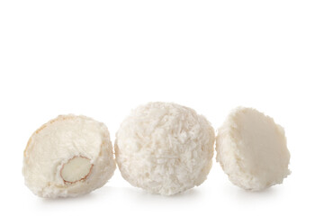 Delicious chocolate candies with coconut topping isolated on white background