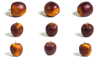 Unique collection of aged apples displayed in an artistic arrangement, capturing the beauty of imperfection and time's passage