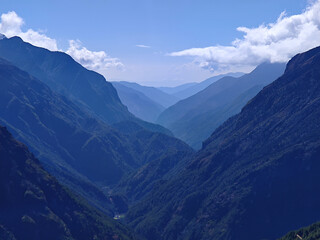 Naklejka premium Deep blue mountain valley layers