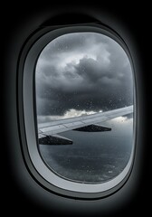 Fototapeta premium view from airplane window bad weather