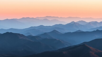 Fototapeta premium Serene Mountain Range at Dawn with Soft Pastel Sky Colors