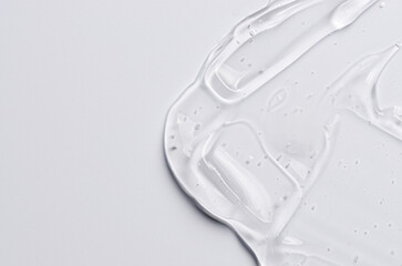 The texture of a cosmetic serum for the face with hyaluronic acid and collagen. Copy space