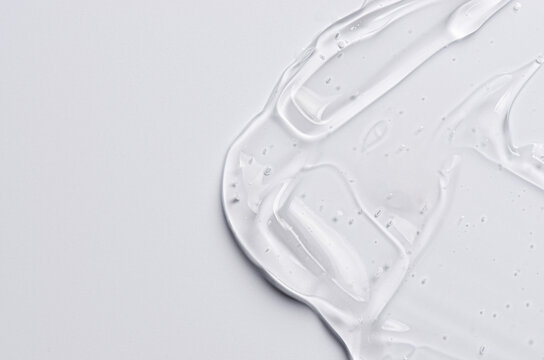 The texture of a cosmetic serum for the face with hyaluronic acid and collagen. Copy space