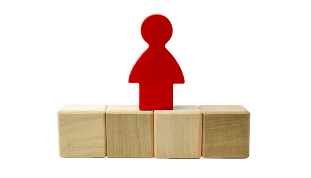 a red figure standing on a wooden cubes, representing leadership and individuality